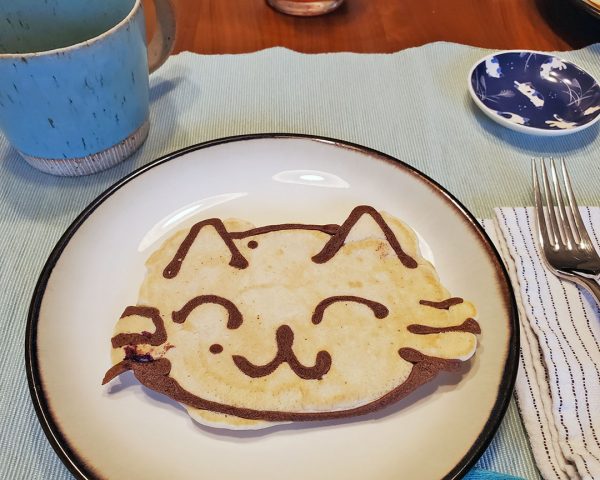 adorable cute kawaii panda having pancake breakfast, Christmas